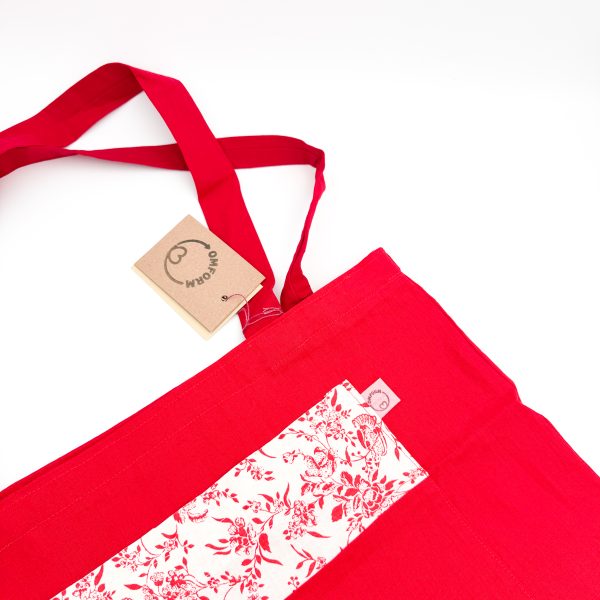 rød mulepose med blomster motiv